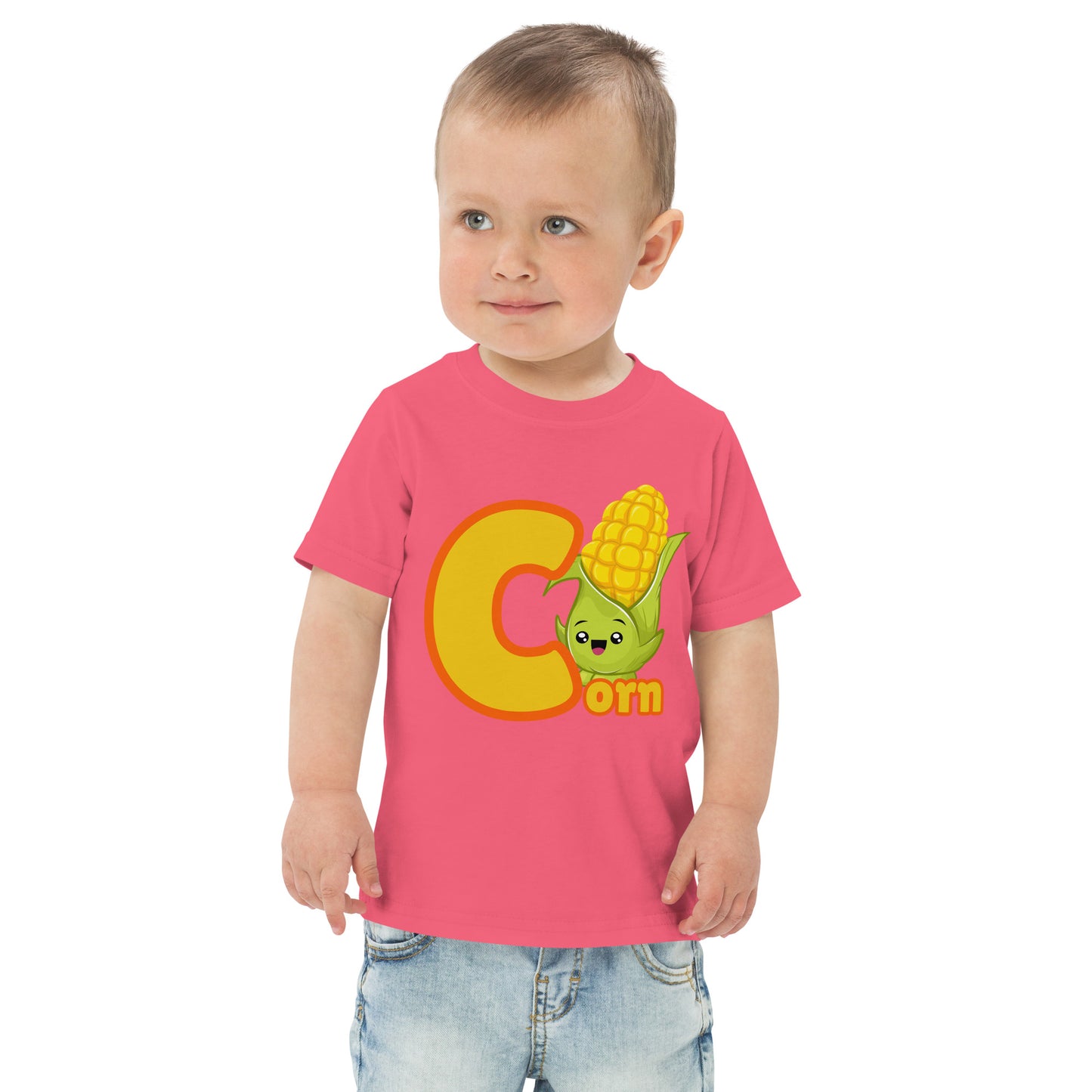 Child wearing a pink shirt designed with Corn image and text on white background