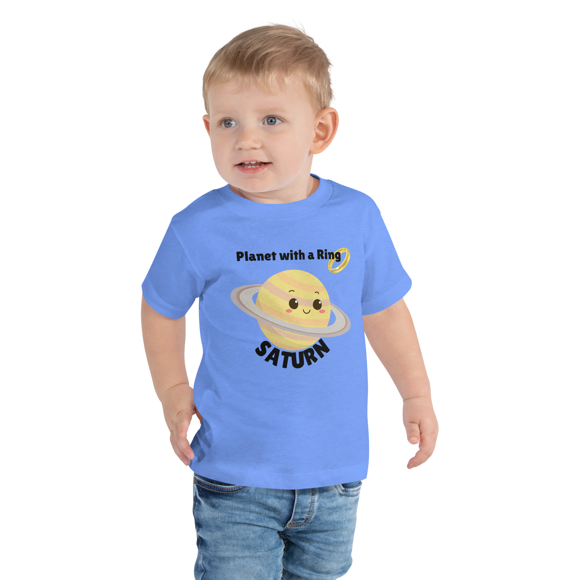 Child wearing a blue t-shirt with bold 'Saturn' text, Saturn graphic, and 'Planet with a Ring' subtext on a transparent background