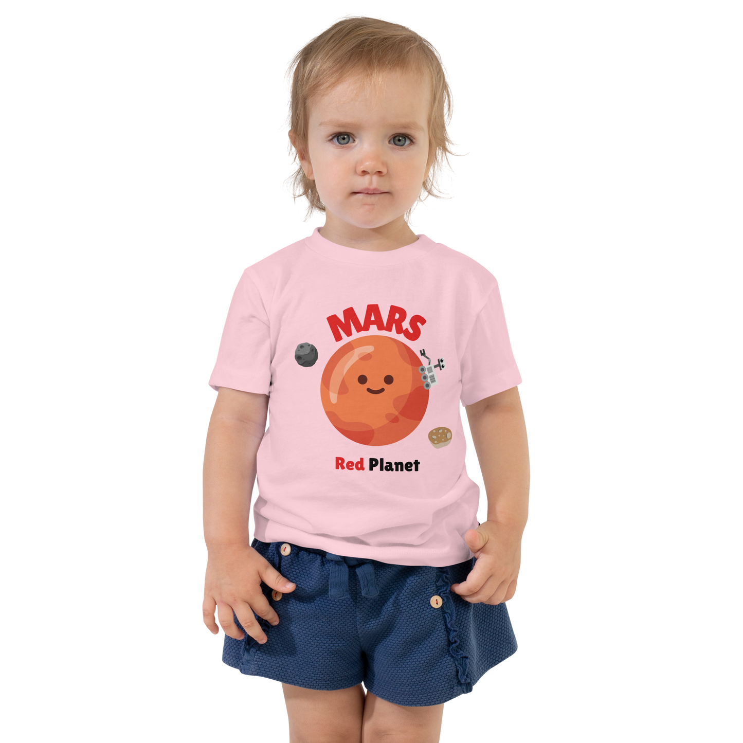 Child wearing a pink t-shirt with bold 'Mars' text, Mars graphic, and 'Red Planet' subtext on a transparent background