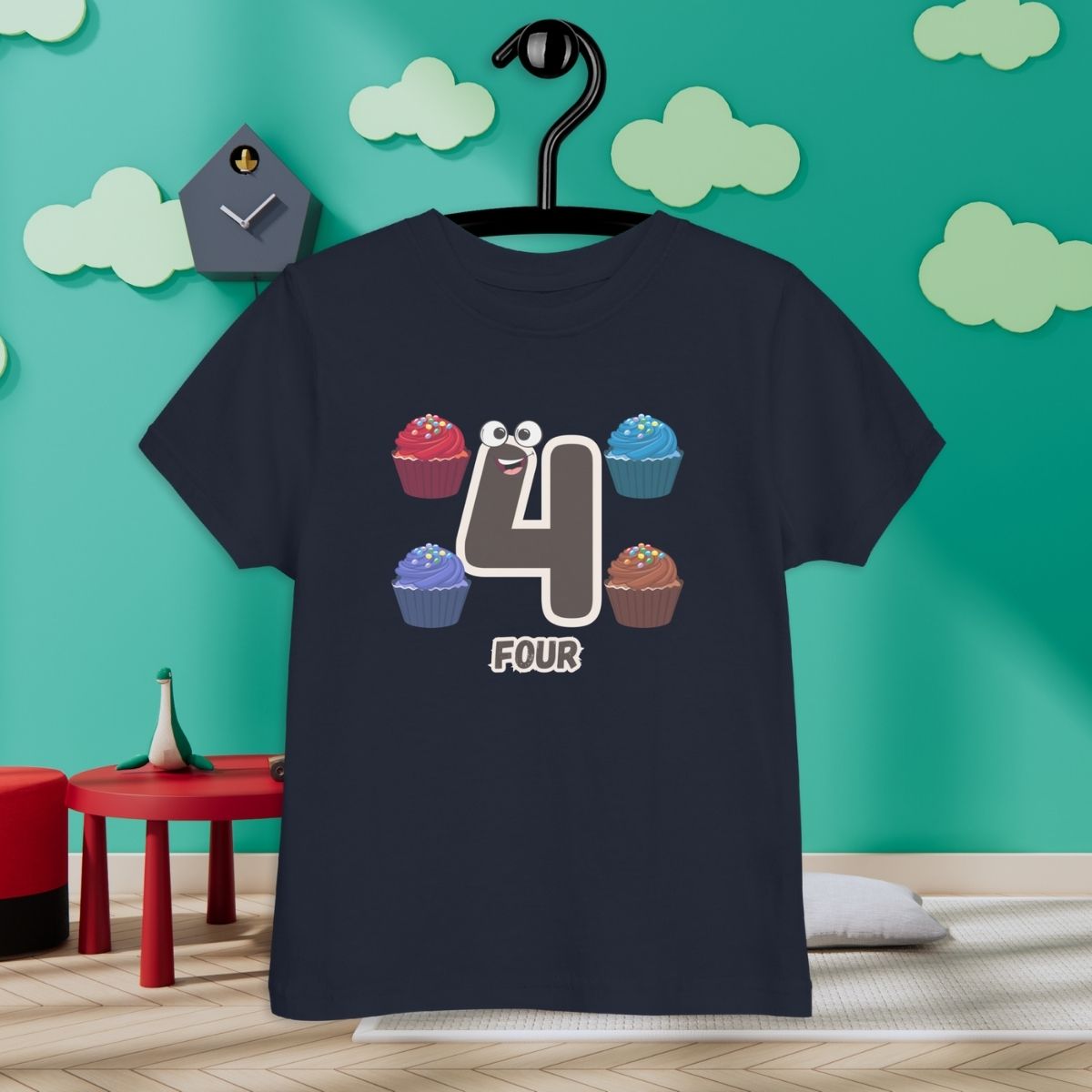 Navy Blue Kid's Shirt designed with number 4 and with 4 cupcakes in room with clouds background