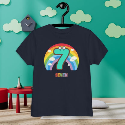 Navy Blue Kid's Shirt designed with number 7 and a rainbow in room with clouds background 