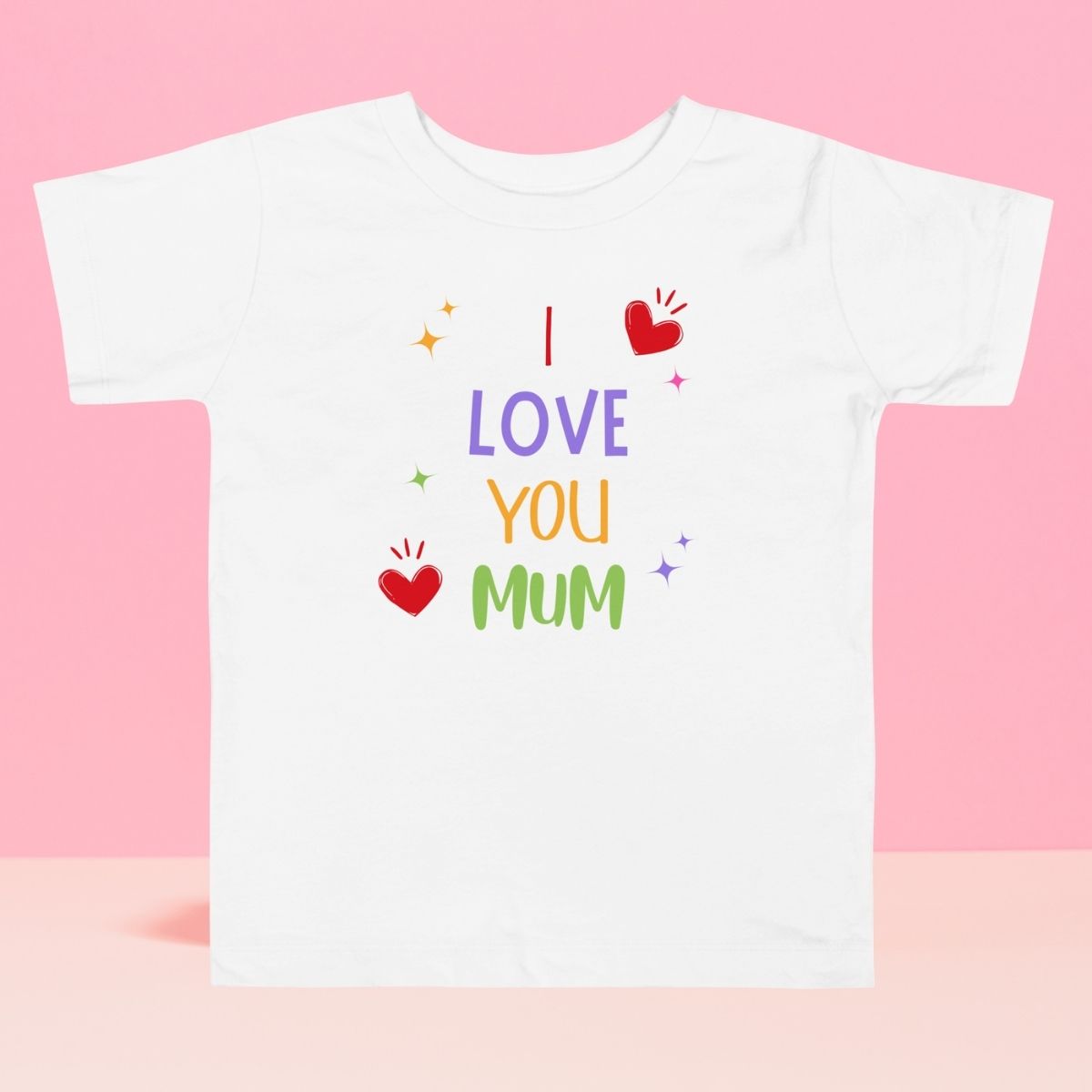 Toddler white t-shirt with 'I Love You Mum' statement design on pink background