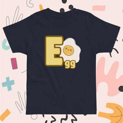 Toddler navy blue shirt designed with Egg image and text on playful pink background