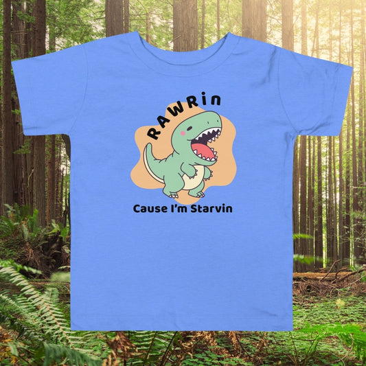 Blue Toddler t-shirt with cartoon T-Rex and "Rawrin' Cause I'm Starvin'" text on jungle background, perfect for dinosaur-loving kids