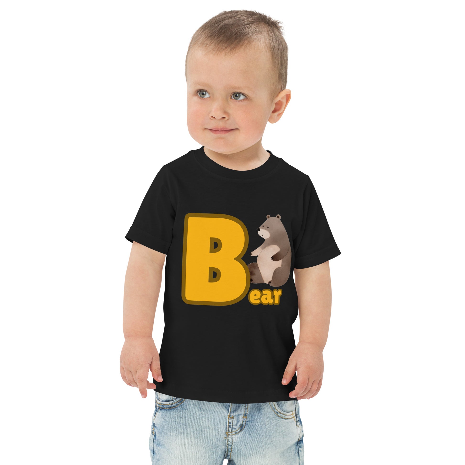Child wearing a black shirt designed with Bear image and text on white background