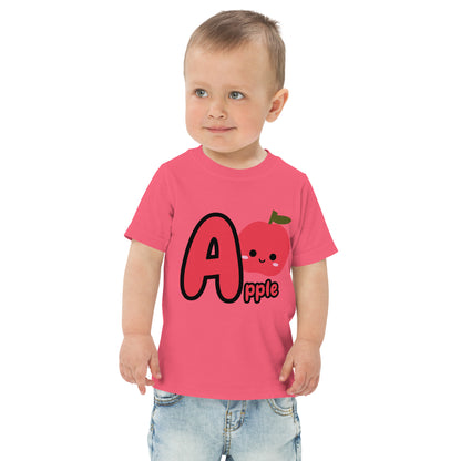 Child wearing a pink shirt designed with Apple image and text on white background
