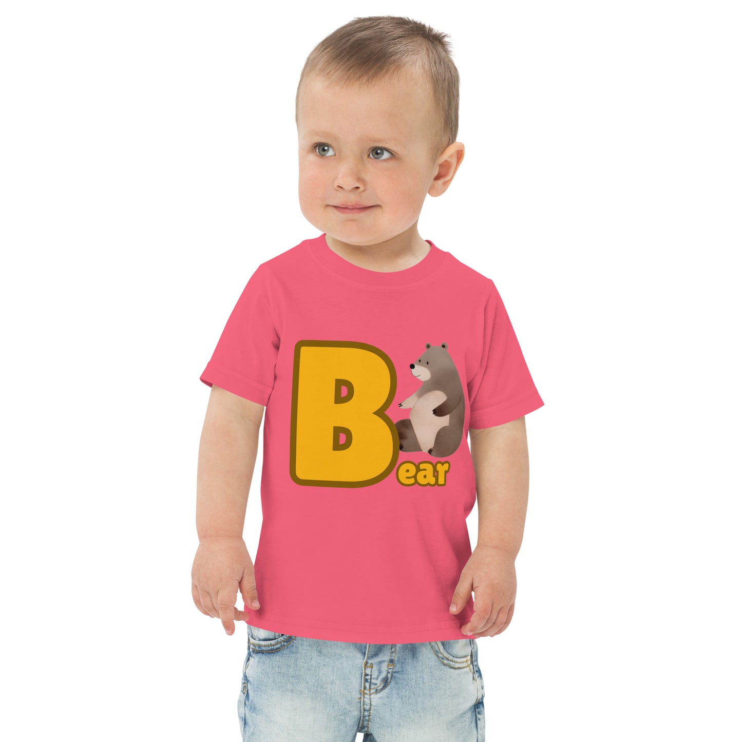 Child wearing a pink shirt designed with Bear image and text on white background