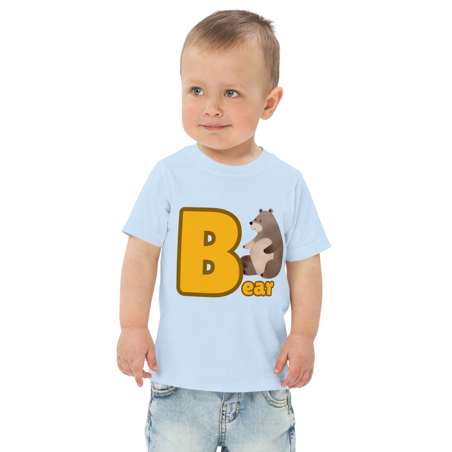 Child wearing a light blue shirt designed with Bear image and text on white background