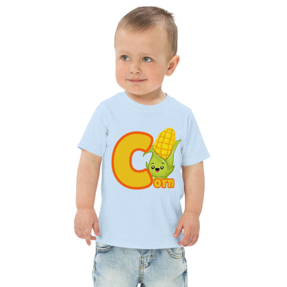 Child wearing a light blue shirt designed with Corn image and text on white background