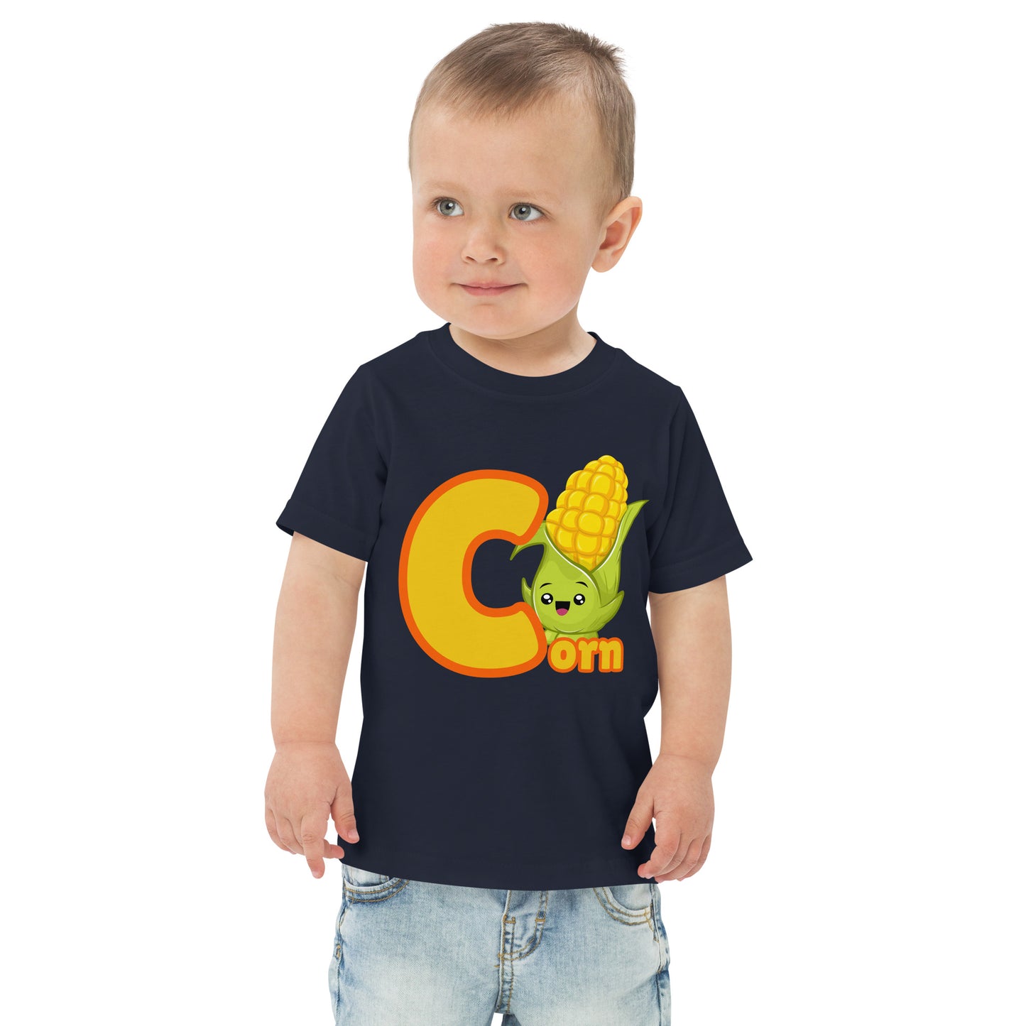 Child wearing a navy blue shirt designed with Corn image and text on white background