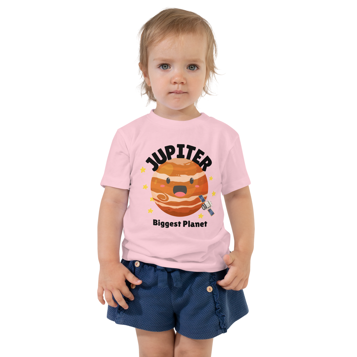 Child wearing a pink t-shirt with bold 'Jupiter' text, Jupiter graphic, and 'Biggest Planet' subtext on a transparent background