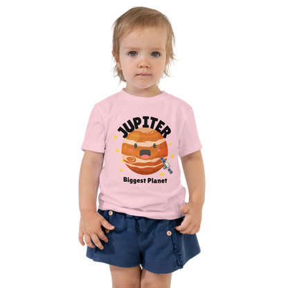 Child wearing a pink t-shirt with bold 'Jupiter' text, Jupiter graphic, and 'Biggest Planet' subtext on a transparent background