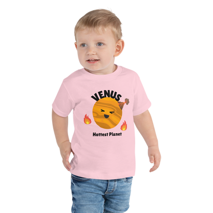 Child wearing a pink t-shirt with bold 'Venus' text, Venus graphic, and 'Hottest Planet' subtext on a transparent background