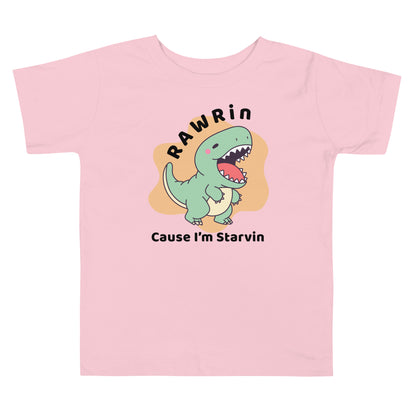 Pink Toddler t-shirt with cartoon T-Rex and "Rawrin' Cause I'm Starvin'" text on white background, perfect for dinosaur-loving kids