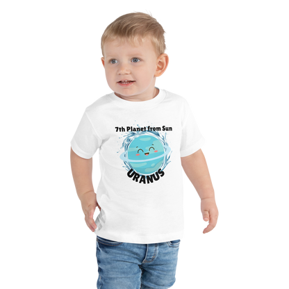 Child wearing a white t-shirt with bold 'Uranus' text, Uranus graphic, and '7th Planet from Sun' subtext on a transparent background