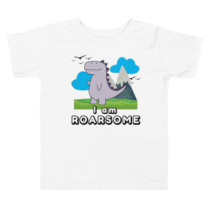 White toddler shirt with "I Am Roarsome" text and cartoon dinosaur in the center on a white background—ideal for dino-loving kids.